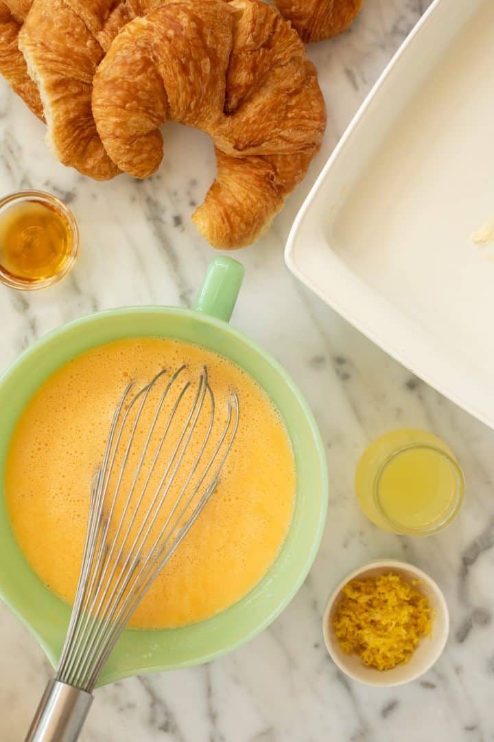 Eggs mixed with buttermilk, lemon juice, zest, and vanilla.