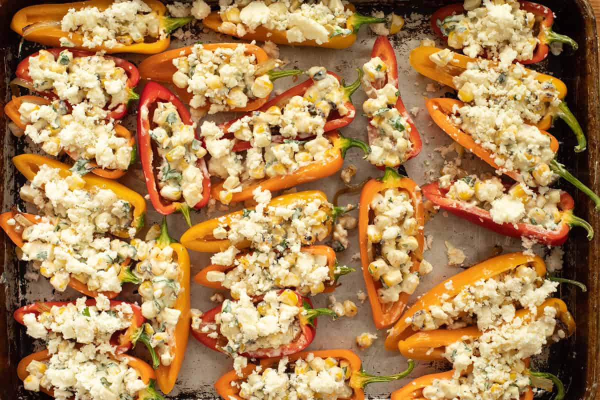 Mini peppers topped with queso fresco.